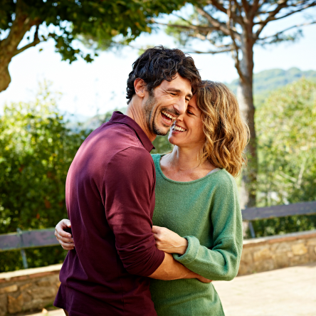 A happy couple outdoors.