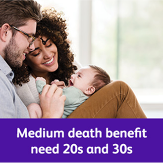 A young couple playing with their baby.