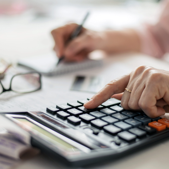 Person calculating retirement details.