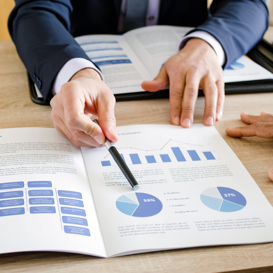 A financial professional explaining information to clients.
