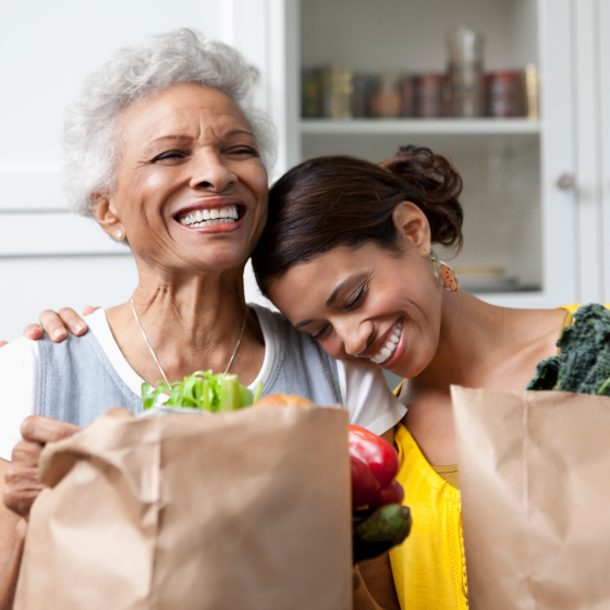  A mother smiling with her adult daughter