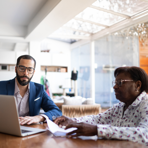 Financial professional discusses the PayPlus option for enhanced income flexibility with client.