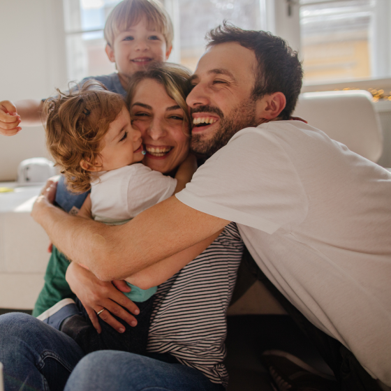 A young family embracing, knowing they are protected with Protective ProClassic II UL.