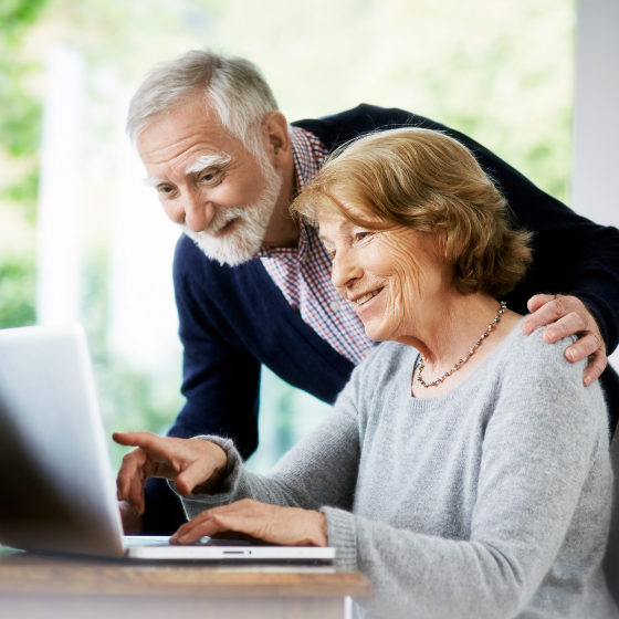 Couple reviewing product specs for Protective Indexed Annuity NY