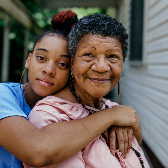 Grandmother looking content knowing her income is protected by the Protective Indexed Annuity NY's built-in waivers.
