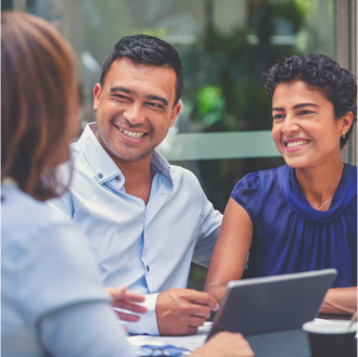 Financial professional using Protective resources to support her conversation with clients.
